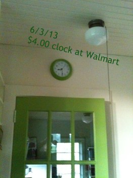 Green walmart clock for $3.99 and the schoolhouse light with pull chain that we kept.