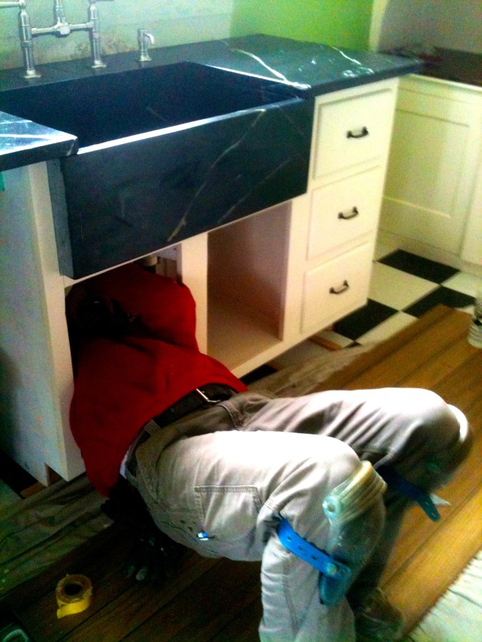 No plumber's butt here. No plumber's gut either!